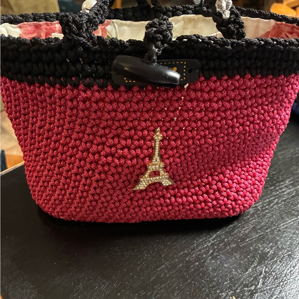 Elegant Red and Black Crochet Mini Bag with Eiffel Tower Charm Port Patel France